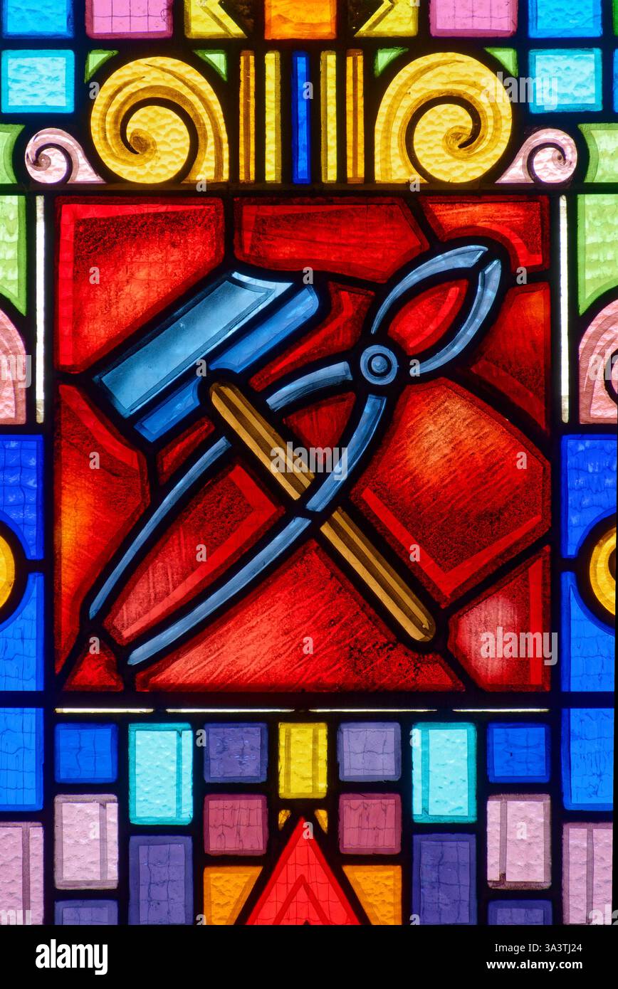 Stained Instruments Saint-Just Malmont, FRANCE - 07-13-2024: Stained glass of The ...