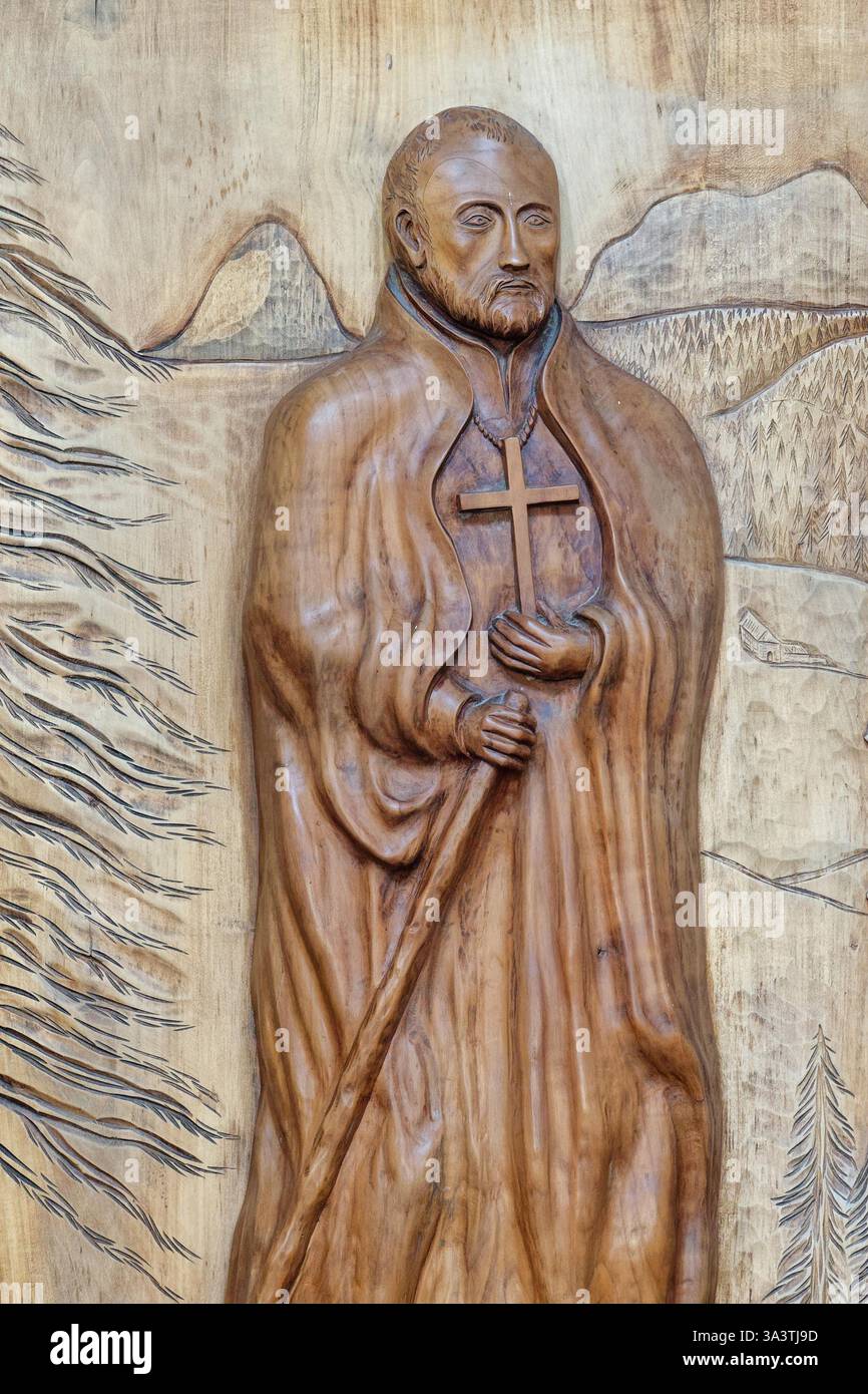 Runcis Rūdis Marlhes, FRANCE - 07-13-2024: Wooden sculpture of Saint John Francis ...