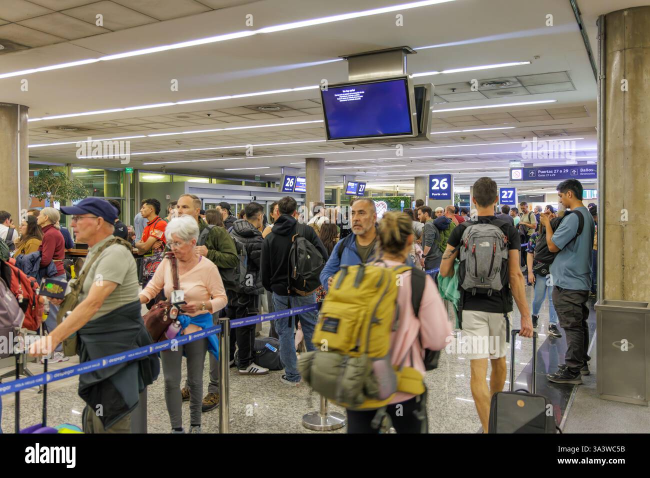 Buenos Aires, Argentina - January 10th, 2025: Tourists at Ezeiza International Airport in Buenos Aires. Stock Photo