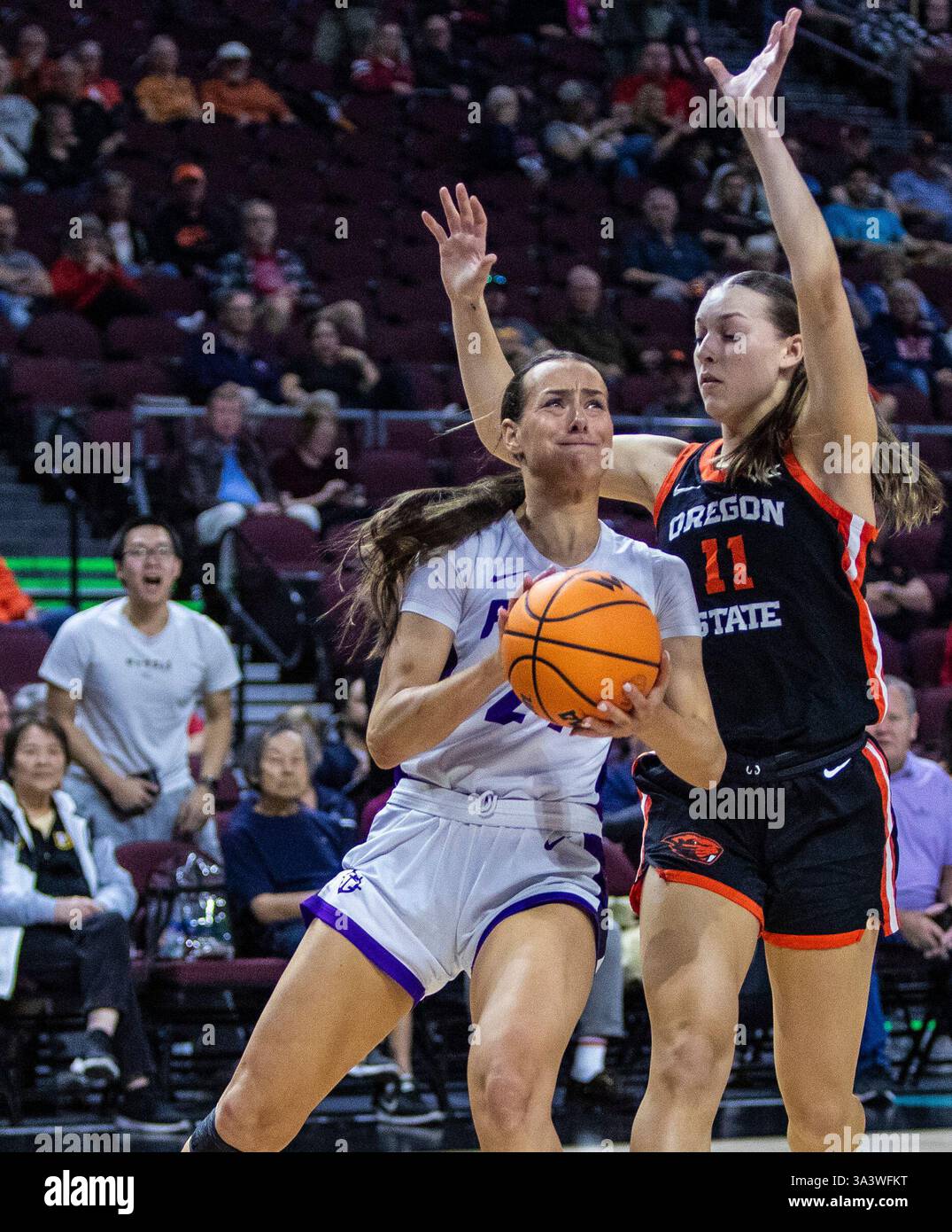 Portland guard Maisie Burnham (24) and Gonzaga forward Eliza Portland guard Maisie Burnham (24) and Gonzaga forward Eliza