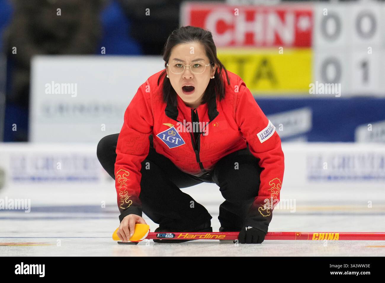 China's skip Wang Rui calls the sweep during the match against Italy at ...