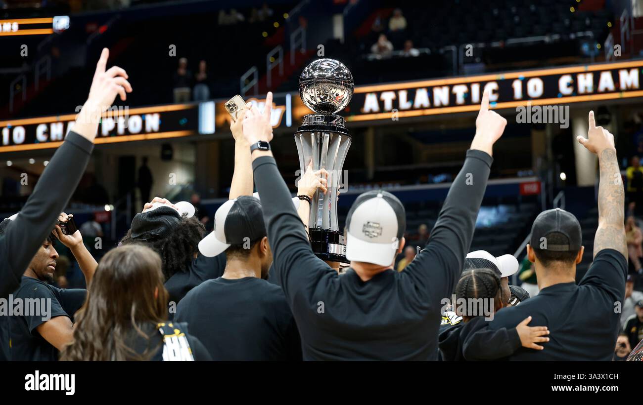 march-16-2025-the-a10-trophy-is-hoisted-after-the-a10-men-s