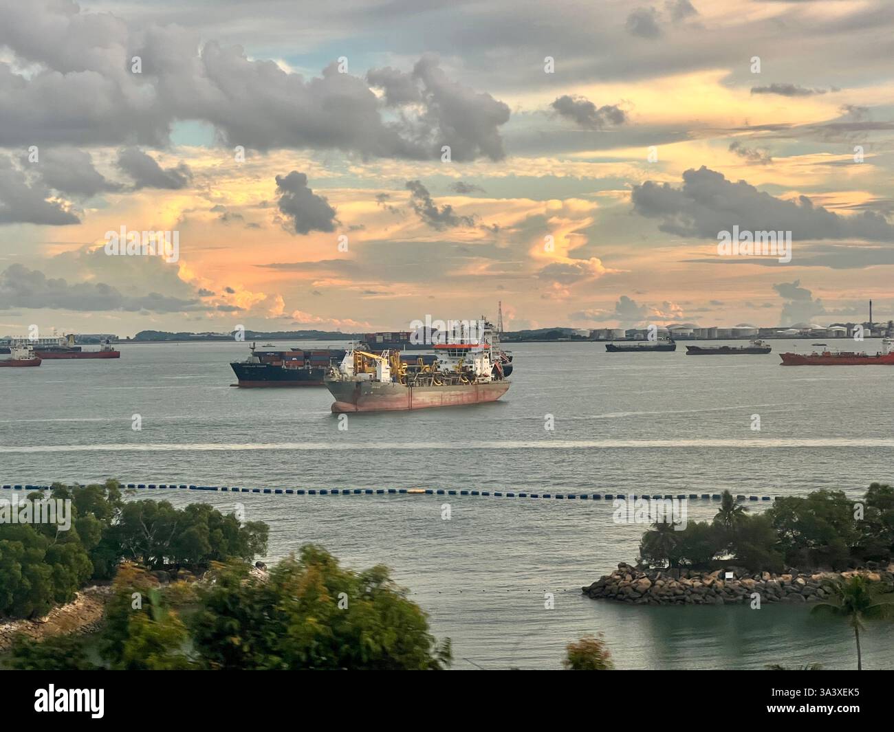 Sentosa Island cable cars in Singapore, offering a breathtaking ride over lush landscapes and coastal waters,pristine beaches, and the bustling city - Smartphone Captured Stock Image