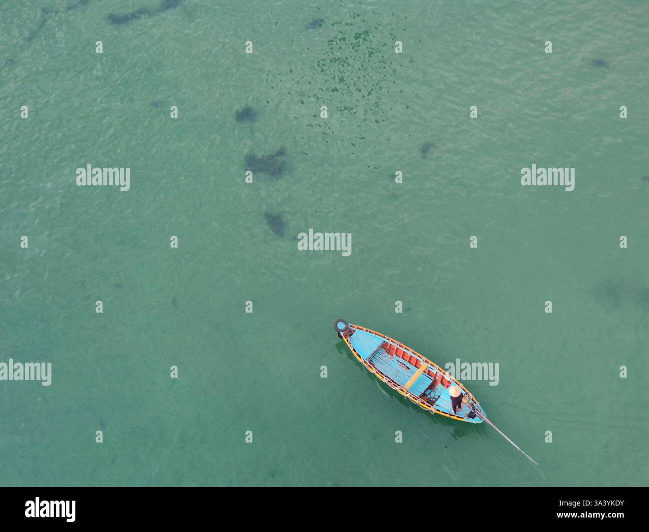 A lonely fisherman. - Smartphone Captured Stock Image
