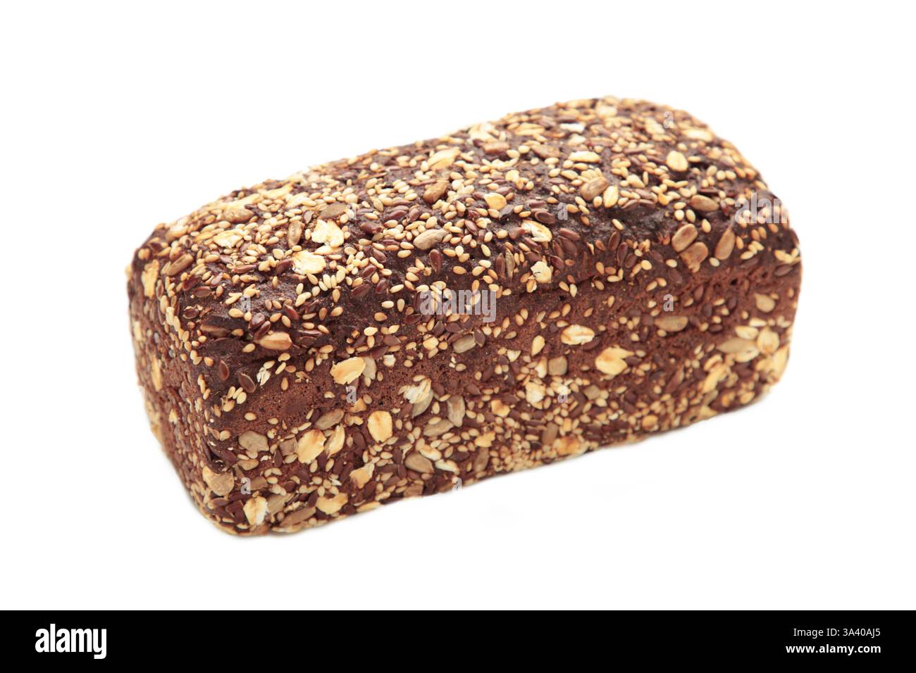Wheat bread with mixed seeds isolated on white background. Top view Stock Photo