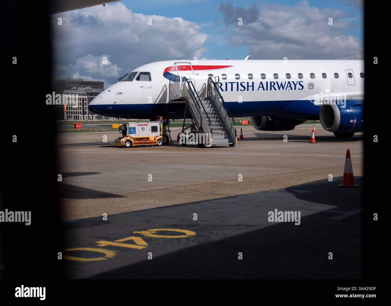 A British Airways aeroplane on the tarmac at London City Airport, London, England. Stock Photo