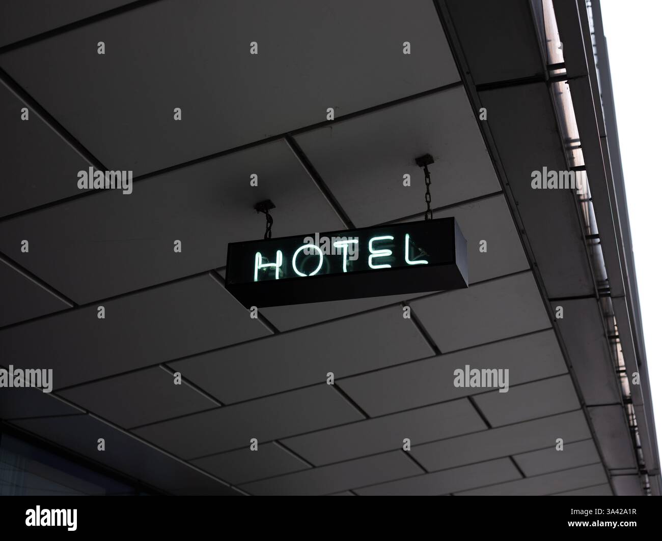 A neon light reading "Hotel" on the South Bank in London, England. Stock Photo