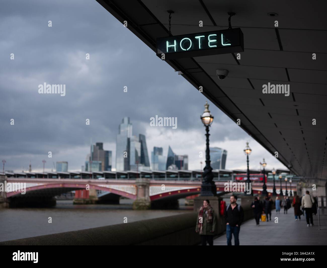 A neon sign reading "Hotel" on the South Bank In London, England. Stock Photo