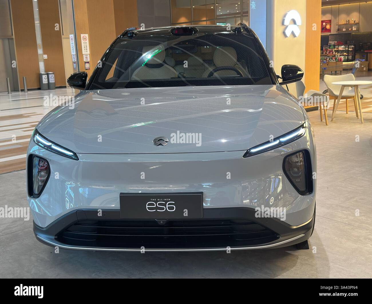 Nanning, China - Nov 13, 2023: Nio ES6 isplayed in a showroom. NIO is a Chinese electric vehicle company headquartered in Shanghai. - Smartphone Captured Stock Image