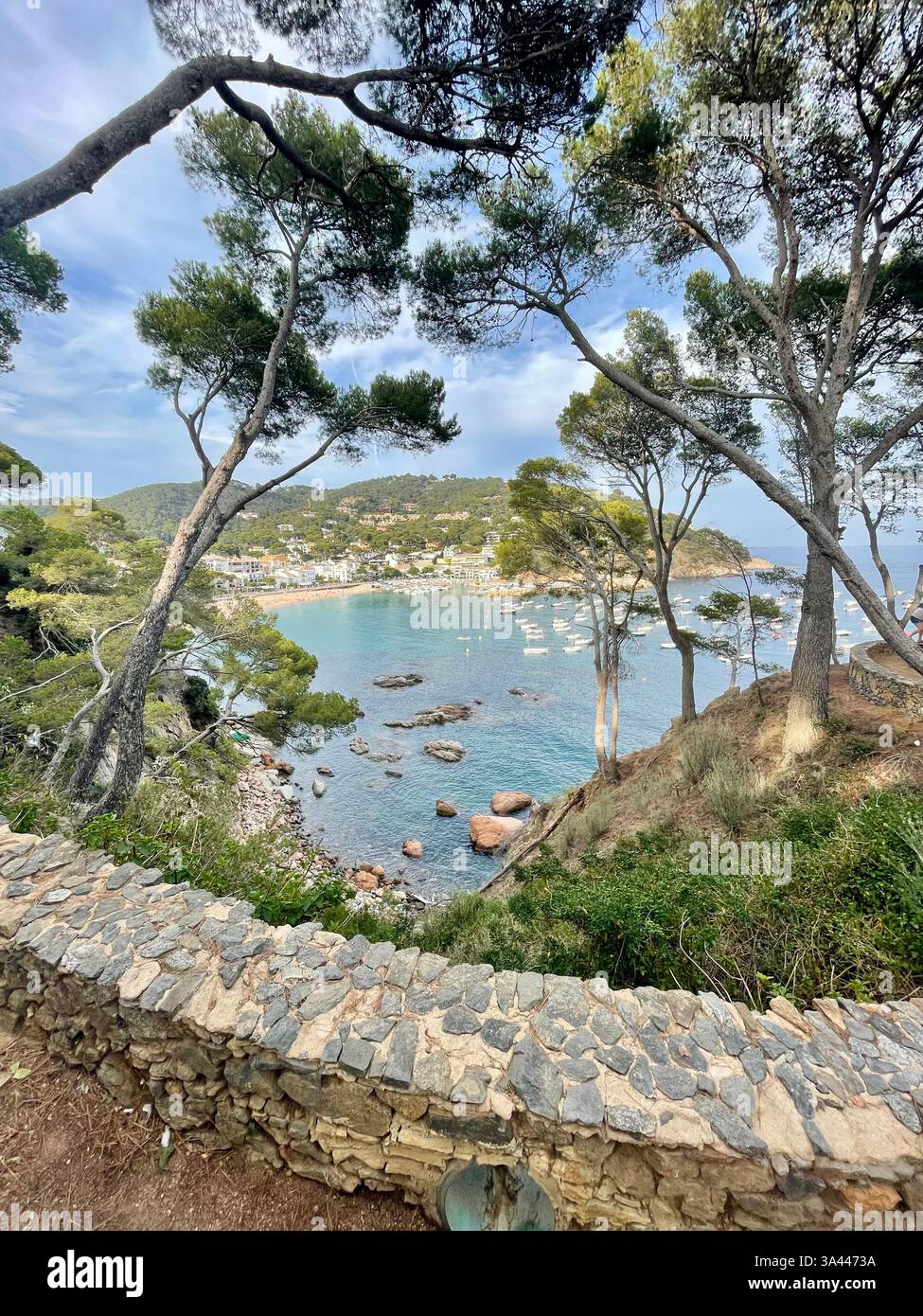 A view of Llafranc from the coastal path between Llafranc and Calella de Palafrugell in Spain - Smartphone Captured Stock Image