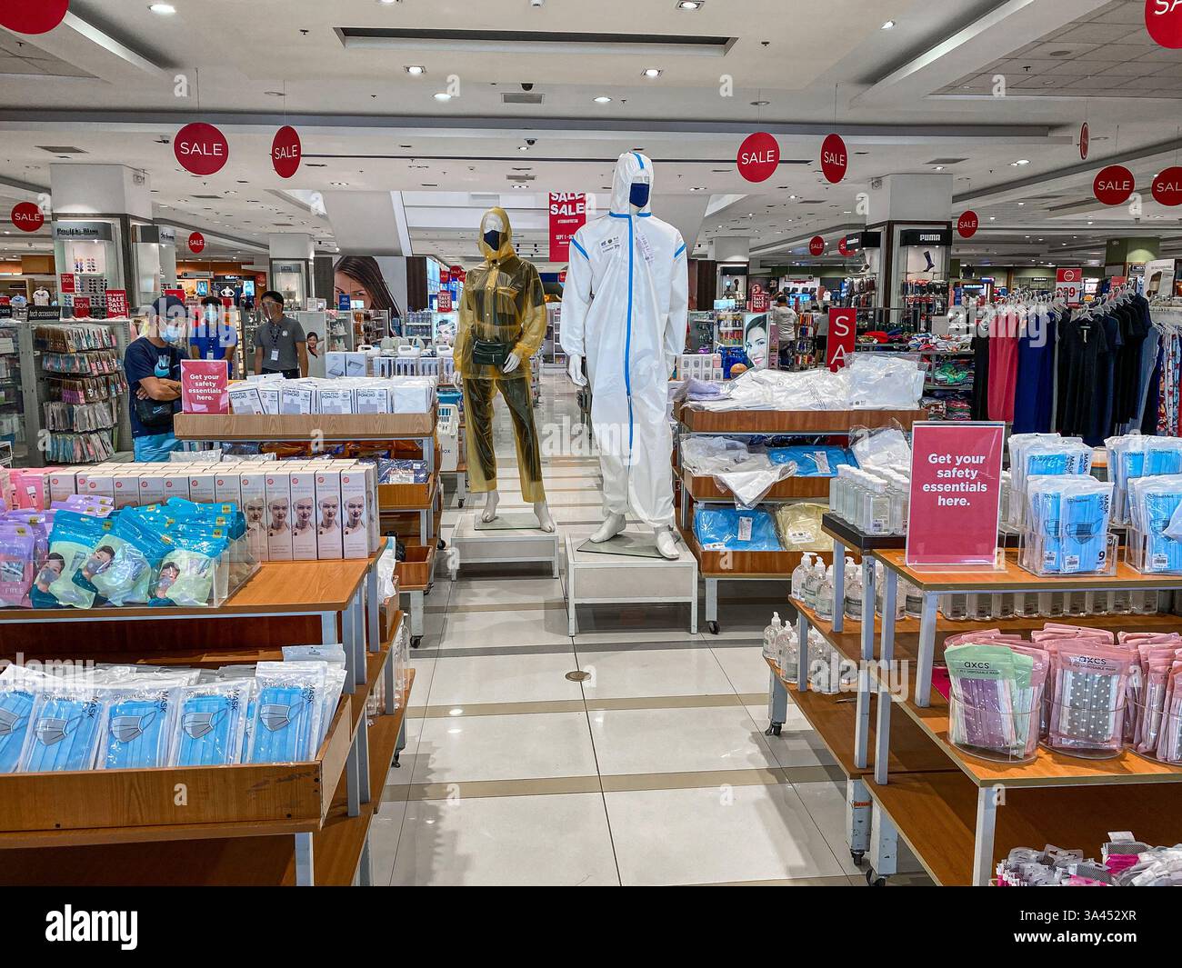 2020 pandemic in SM Store: Personal protective equipments against coronavirus. The Philippines experienced one of world’s longest COVID-19 lockdowns - Smartphone Captured Stock Image