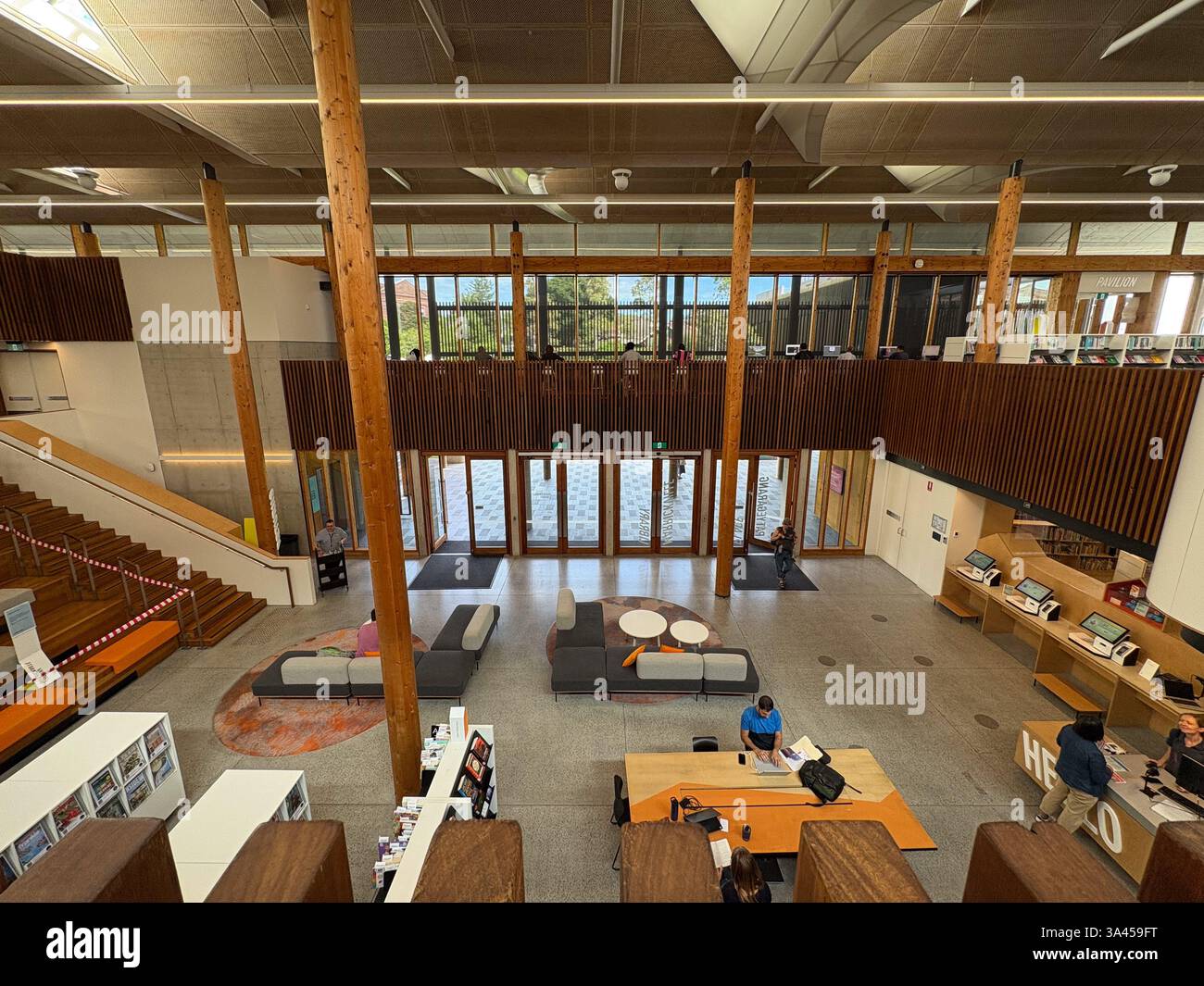 Library Readers View Readers sit at a high window seat at Marrickville Library Sydney ...