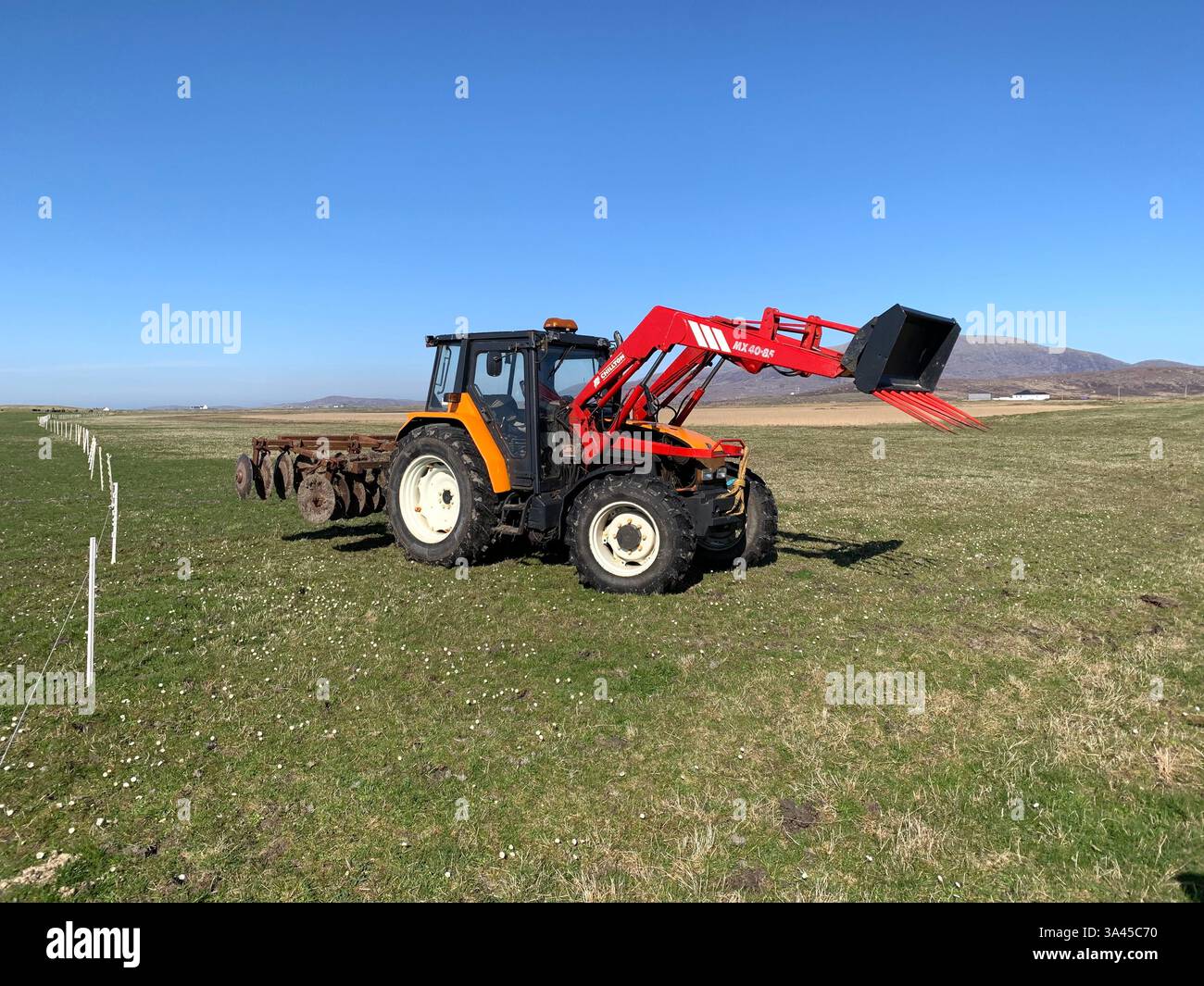 South Uist  Isle of South Uist Rubha Ban West Coast of Scotland  Island Islands weather peace nobody land Island warm sunny shore Tractor - Smartphone Captured Stock Image