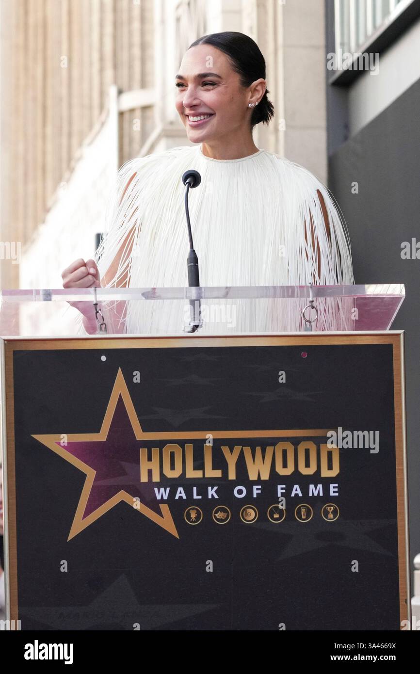 Gal Gadot speaks at a ceremony honoring her with a star on the