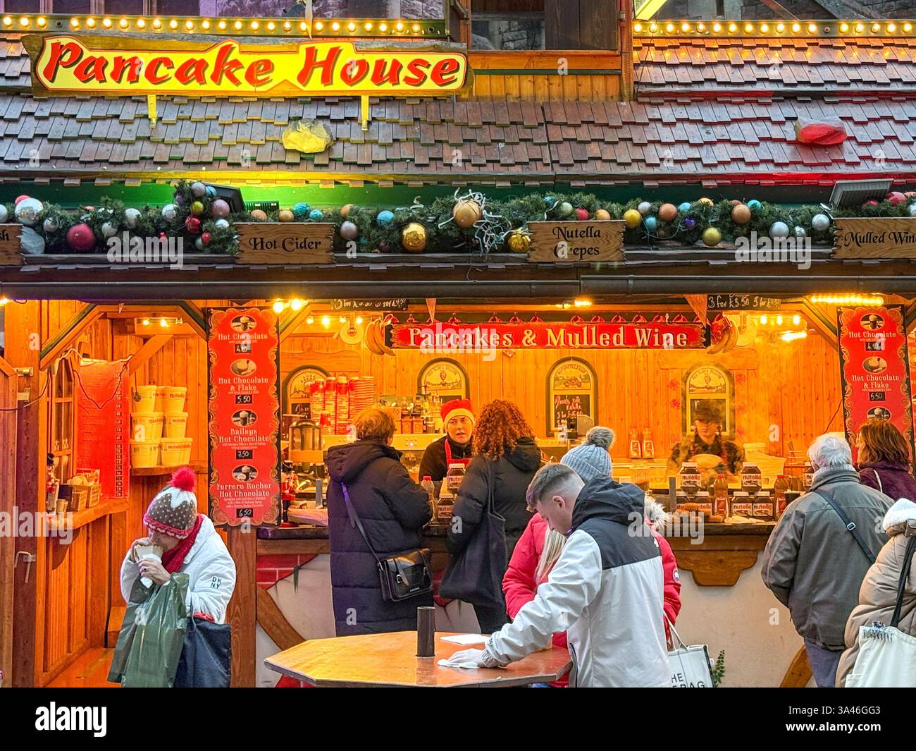 Cardiff, Wales, UK - 11 December 2024: Pancake House stall at the Cardiff Festive Quarter Christmas Market in the city centre - Smartphone Captured Stock Image