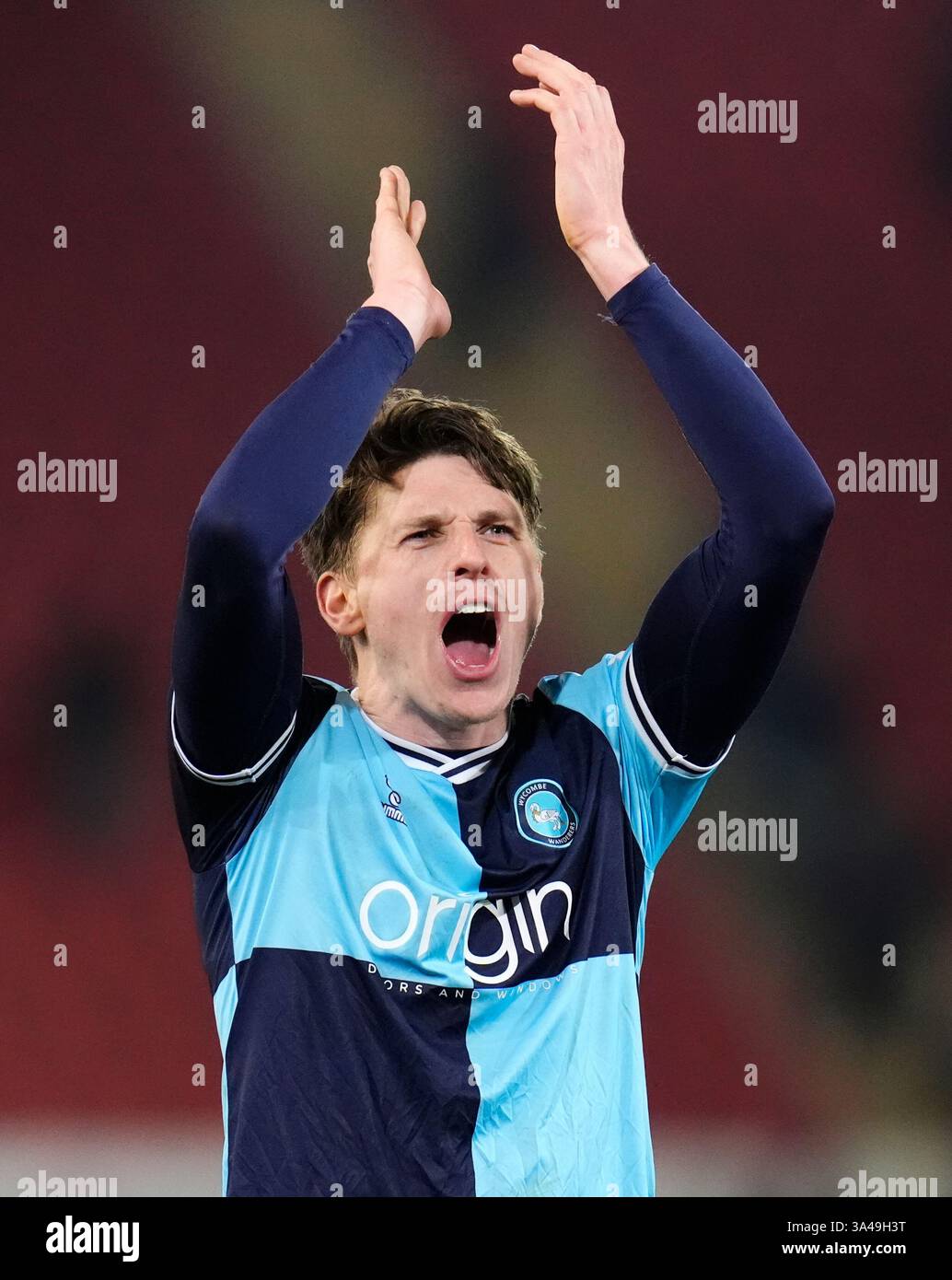 Wycombe Wanderers' Adam Reach applauds the fans following the Sky Bet ...