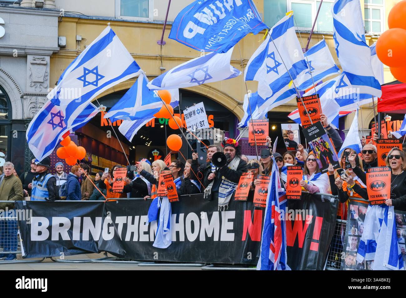 Pro Mask Sign March A pro-Israel counter-protest takes place along the route of the ...
