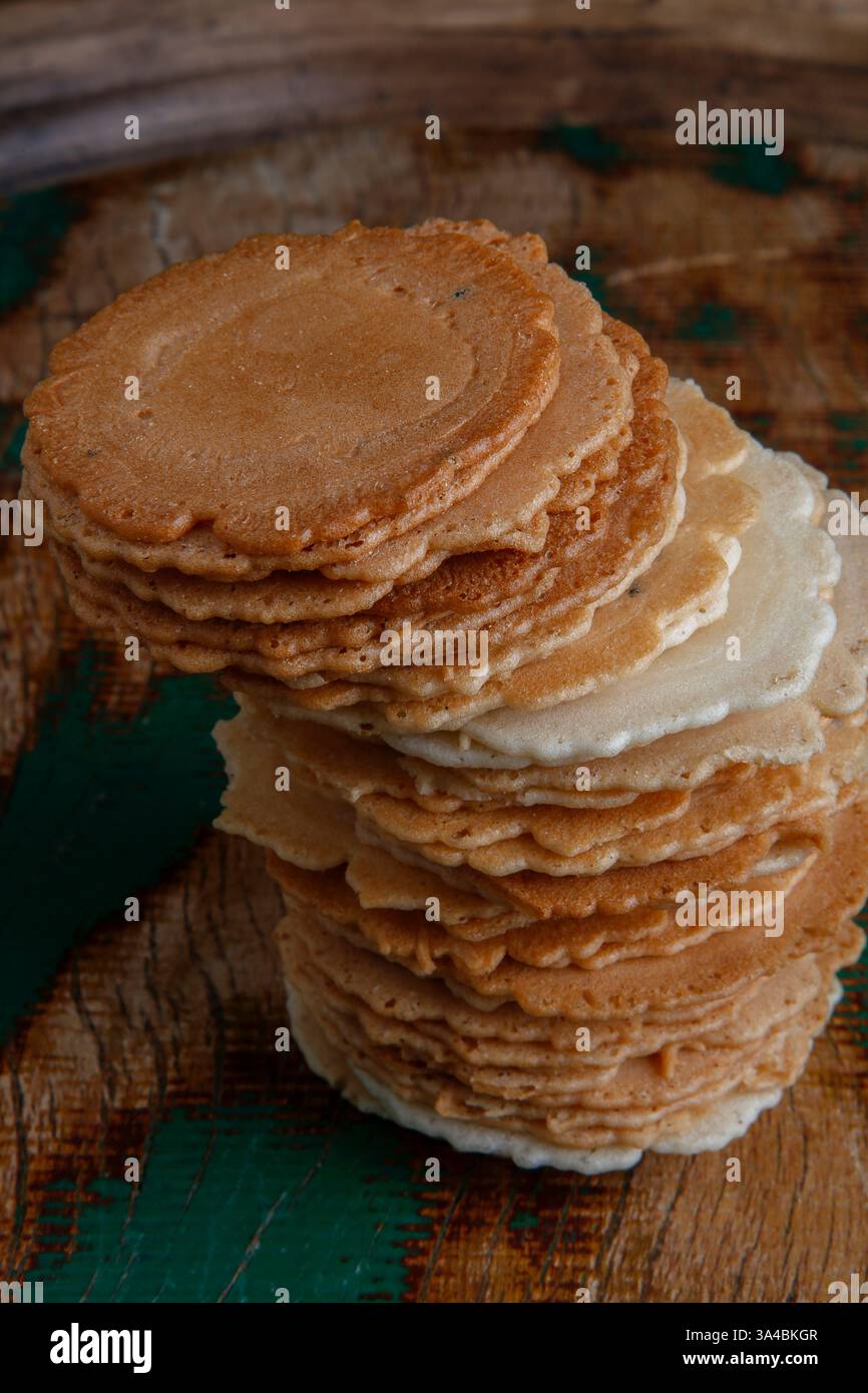 Japanese baked rice snack named Senbei on wood background Stock Photo