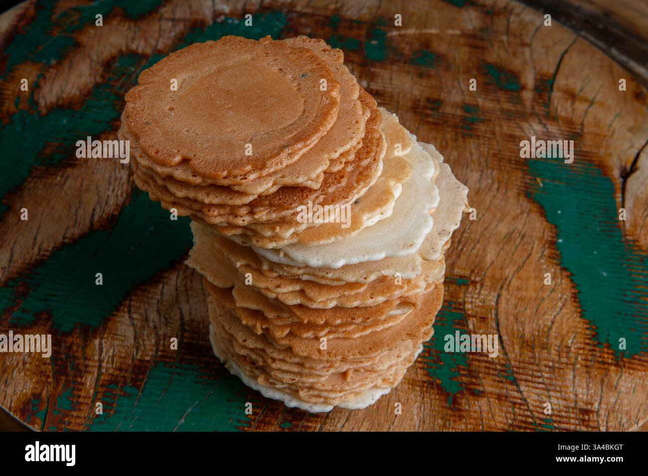 Japanese baked rice snack named Senbei on wood background Stock Photo