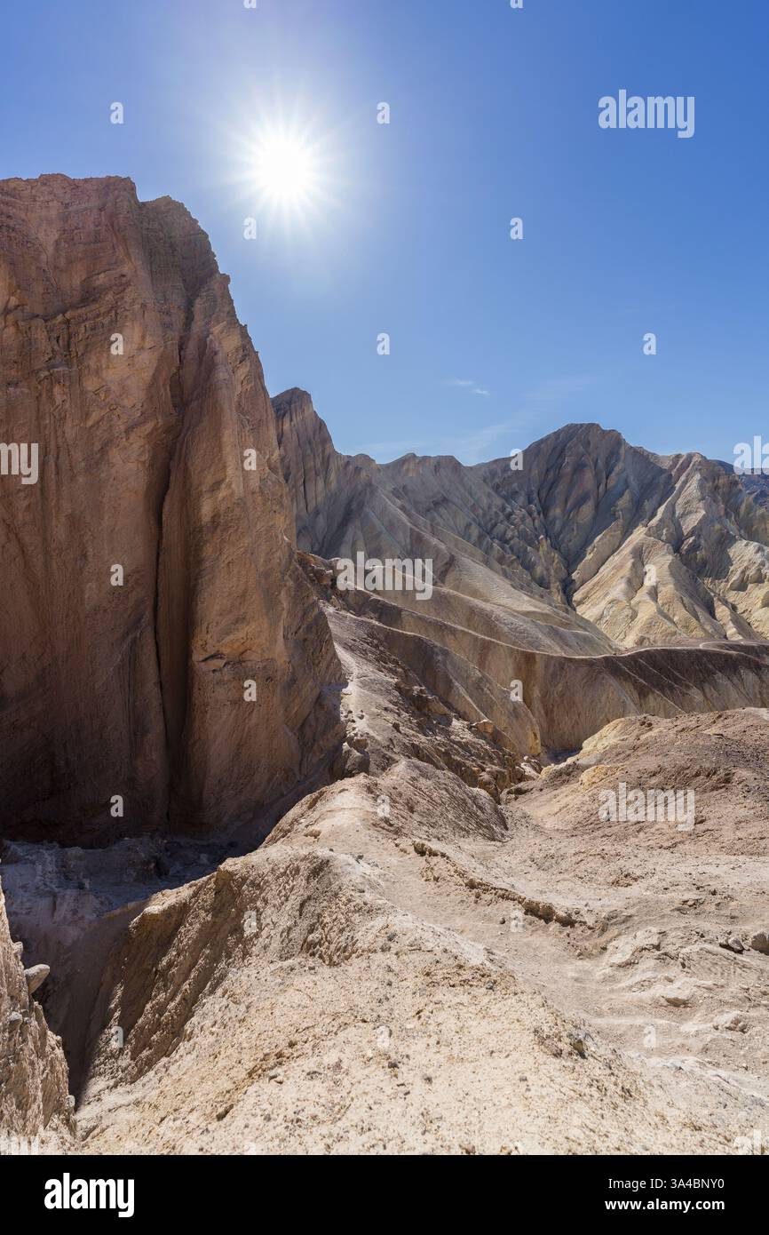 Badlands trail path at Death Valley National Park in California. Vertical View. Stock Photo