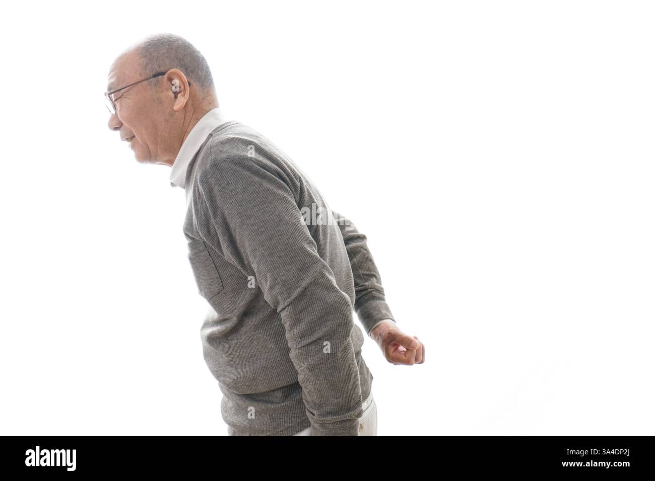 Senior man suffering from back pain Stock Photo - Alamy