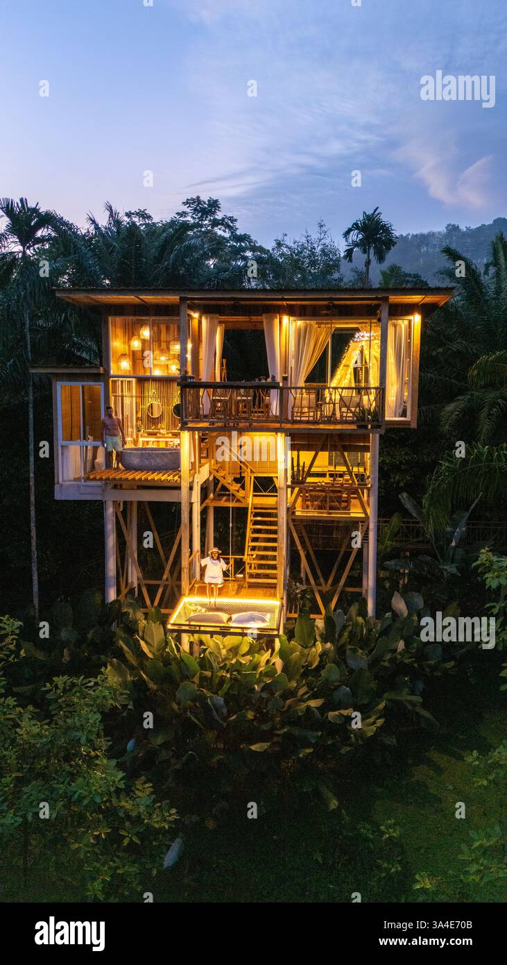 Treehouse sunset wooden nestled hi-res stock photography and images - Alamy