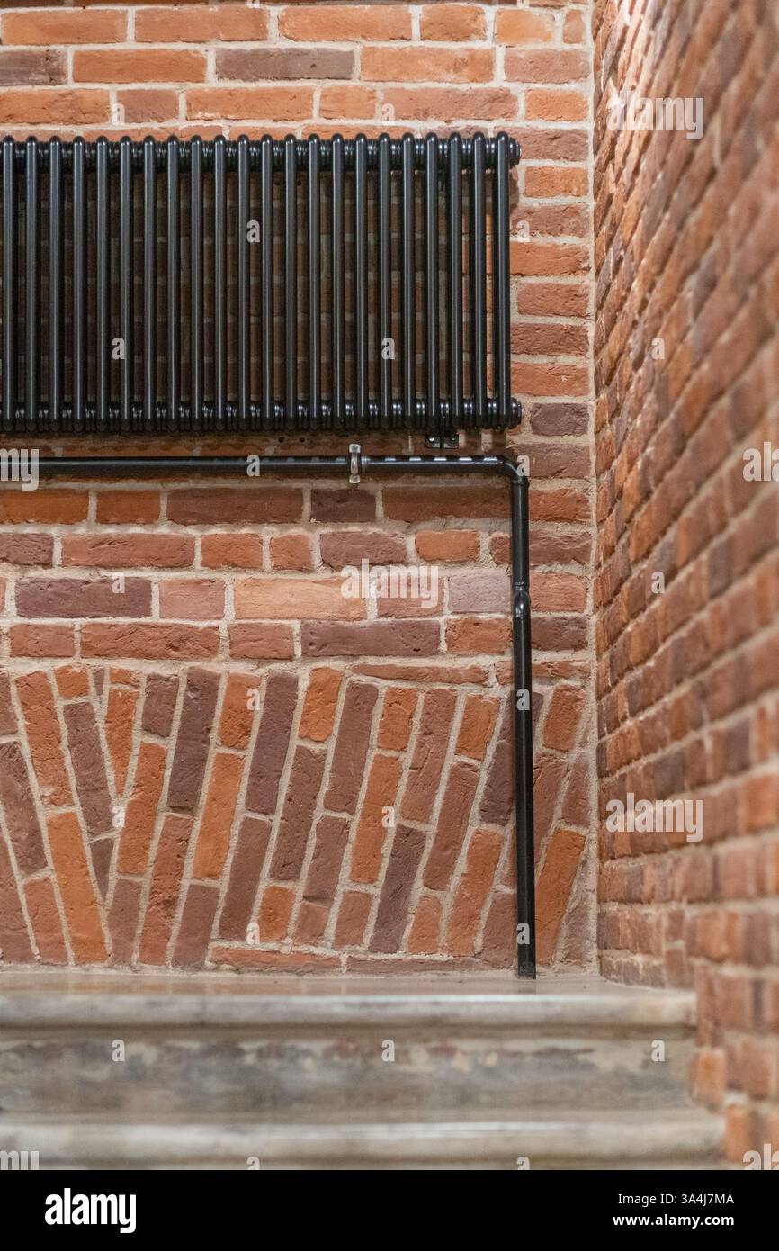 Brick walls create a warm atmosphere in the lobby of a St. Petersburg ...