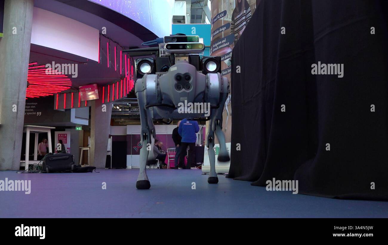 Screengrab taken from PA Video dated 18/03/25 of Robbie the RoboGuide, exhibited at RNIB Scotland's Inclusive Design for Sustainability Conference at the Glasgow Science Centre. The robot dog designed to assist blind people which can give guided tours of museums has been hailed as a 'game-changer'. Robbie, designed by researchers at the University of Glasgow, is hoped to provide life-changing experiences for visually impaired people, in indoor environments such as museums and supermarkets. Issue date: Wednesday March 19, 2025. Stock Photo
