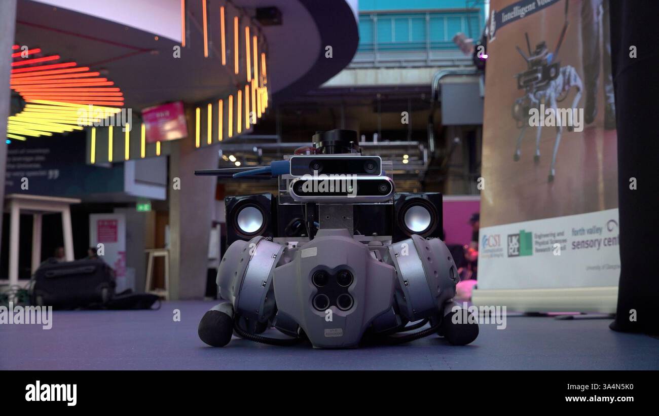 Screengrab taken from PA Video dated 18/03/25 of Robbie the RoboGuide, exhibited at RNIB Scotland's Inclusive Design for Sustainability Conference at the Glasgow Science Centre. The robot dog designed to assist blind people which can give guided tours of museums has been hailed as a 'game-changer'. Robbie, designed by researchers at the University of Glasgow, is hoped to provide life-changing experiences for visually impaired people, in indoor environments such as museums and supermarkets. Issue date: Wednesday March 19, 2025. Stock Photo