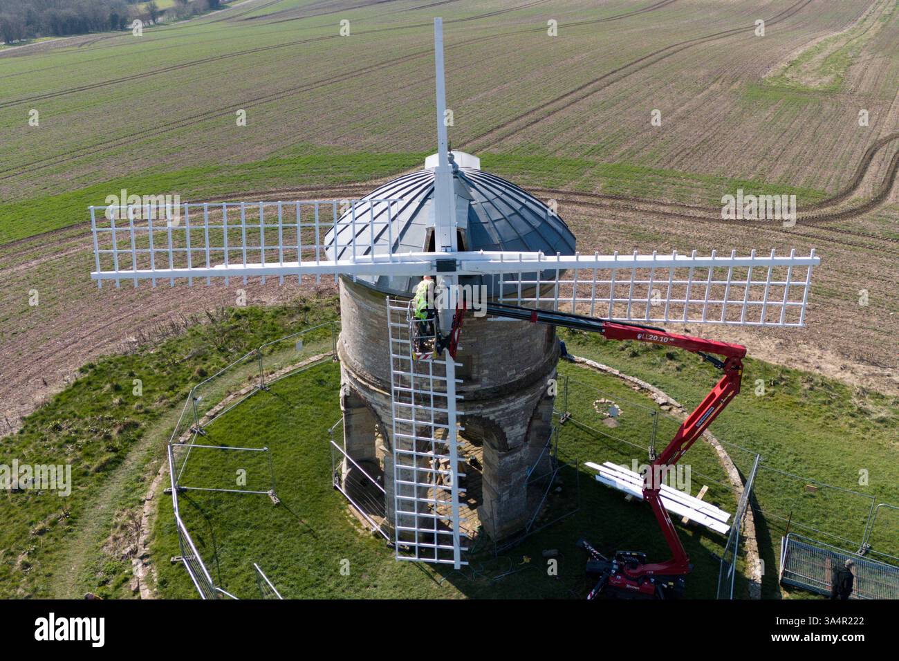 Specialist engineers install new sails on the 17th-century Chesterton Windmill in Warwickshire. Picture date: Wednesday March 19, 2025. Stock Photo
