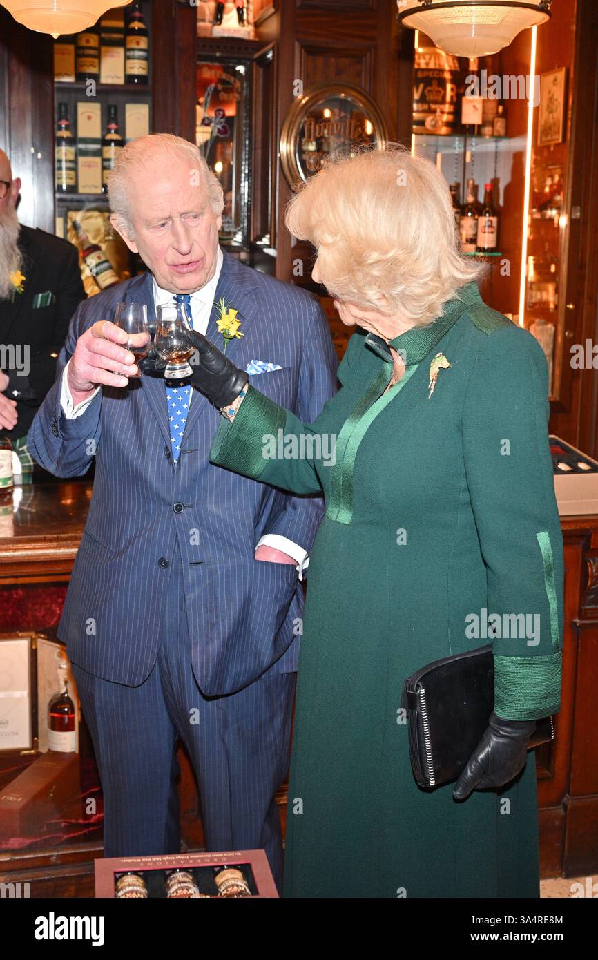 King Charles III and Queen Camilla taste whiskey at The Friend at Hand