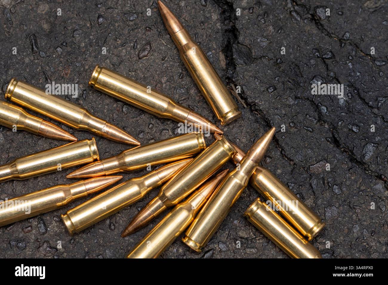 Scattered bullets on the road hint at street clashes, crime and hostilities Stock Photo