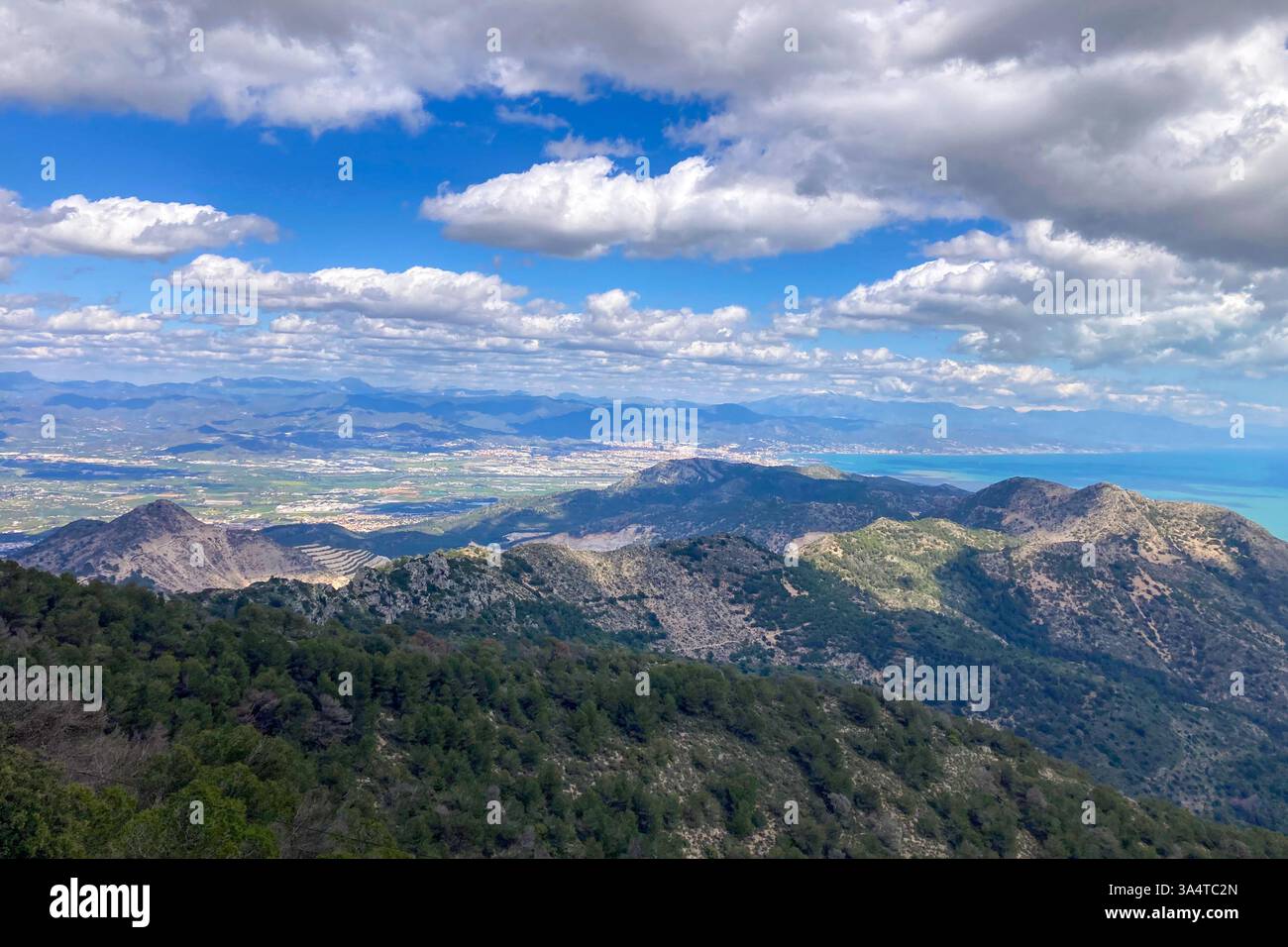 Panoramic view unfolds from the scenic hiking path leading to Mijas peak, showcasing the stunning landscapes of Andalusia, Malaga, Spain - Smartphone Captured Stock Image