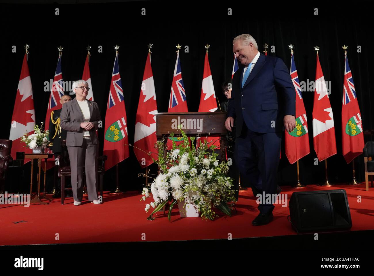 Premier Doug Ford smiles as he finishes reaffirming his oath as premier ...