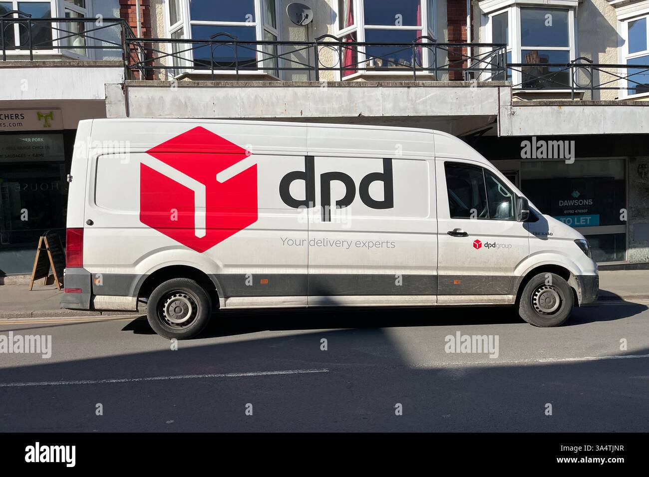 DPD Delivery Van parked in Mumbles. Swansea, Wales, United Kingdom. 18th March 2025. - Smartphone Captured Stock Image