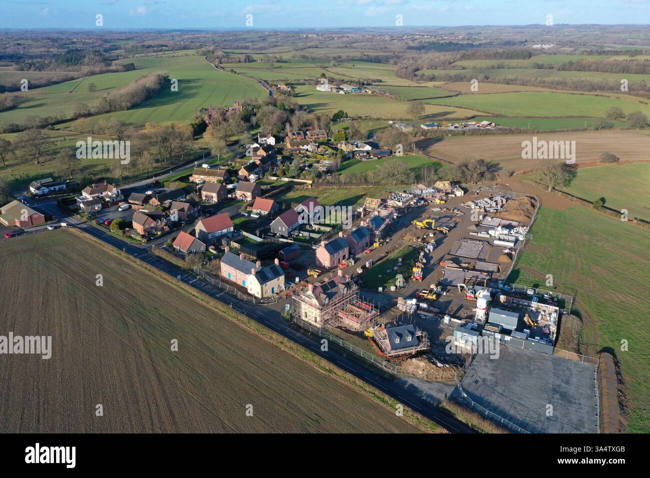 Drone aerial photo of new housing under construction at Kinlet village, Shropshire, almost doubling the village size.  March 2025 Stock Photo
