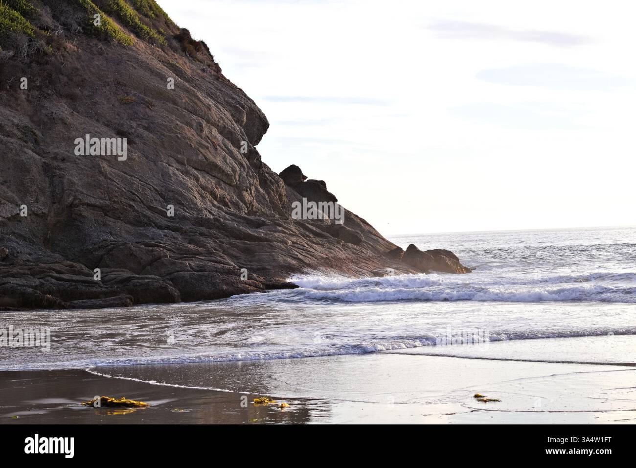 waves breaking on the coastline Stock Photo
