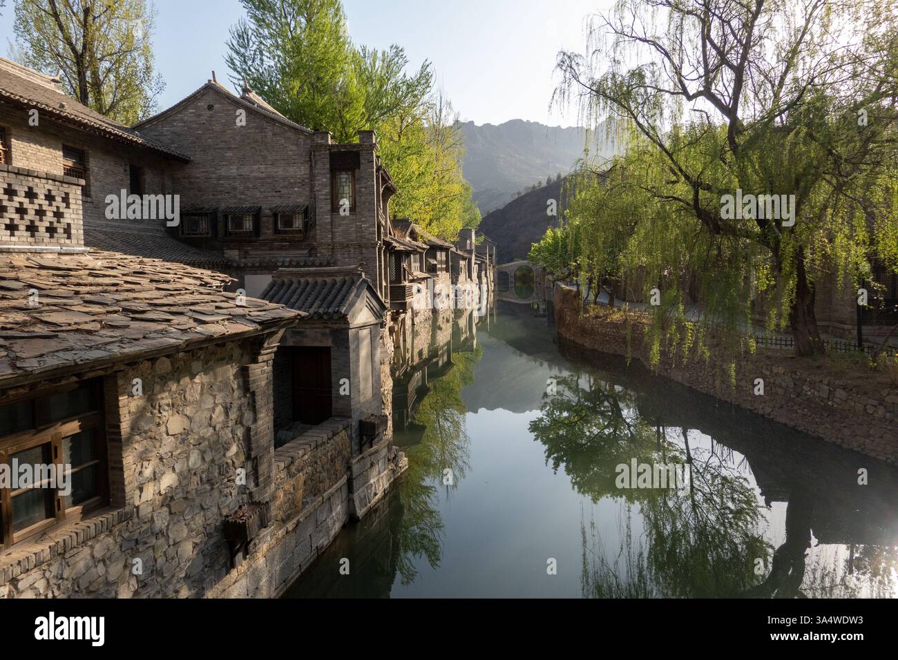 The Gubei Water Town, north of Beijing, is nestled at the foot of the Simatai Great Wall. Stock Photo