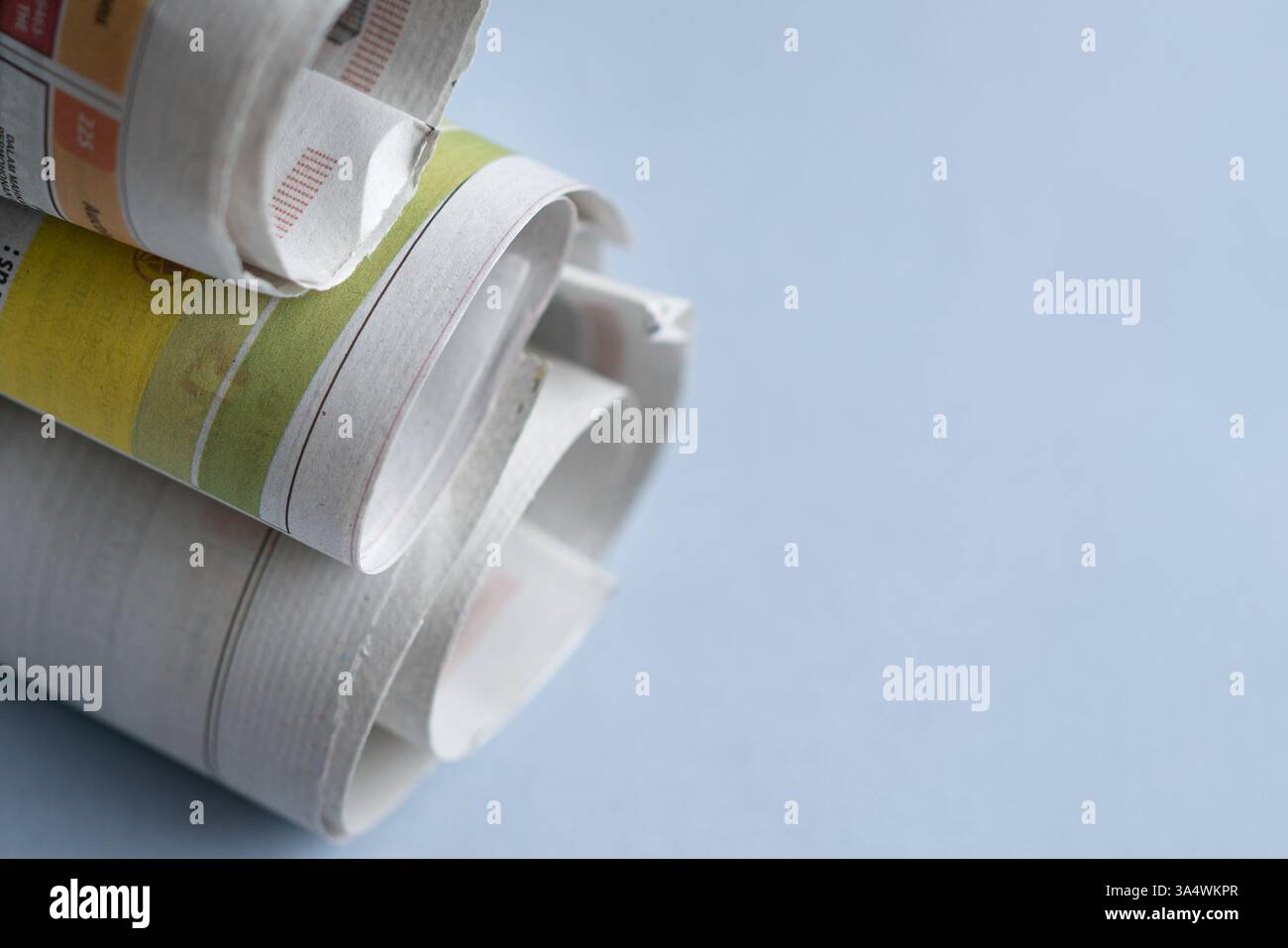 Roll of newspapers, copy space. Stock Photo