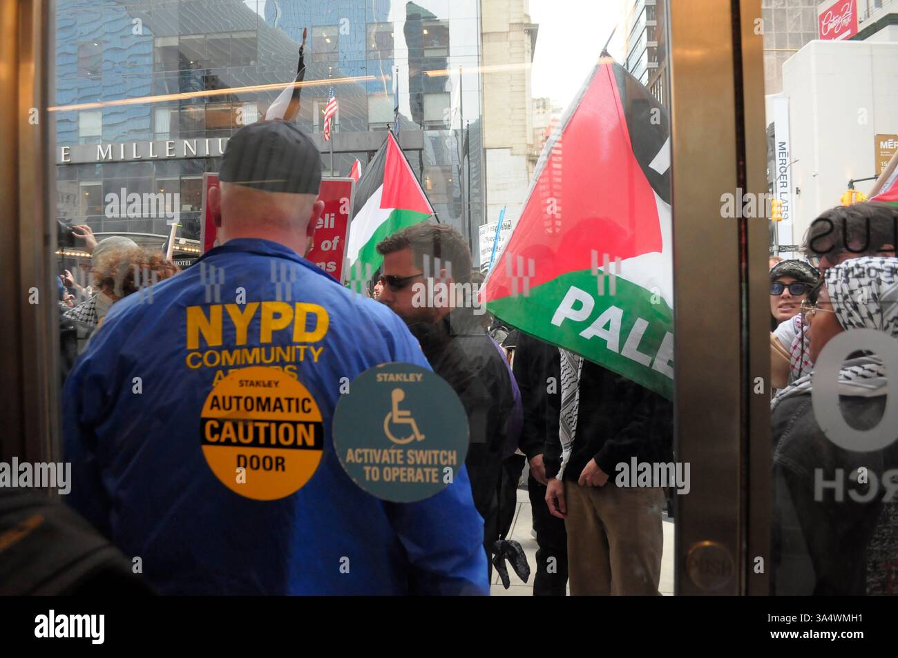 Members of the New York City Police Department block entrance to the ...