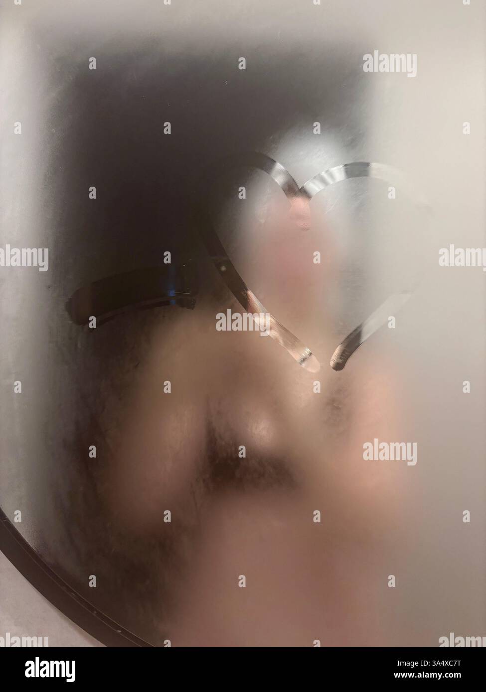 Woman taking selfie in foggy bathroom mirror after shower. High quality  photo Stock Photo - Alamy, image size:975x1390