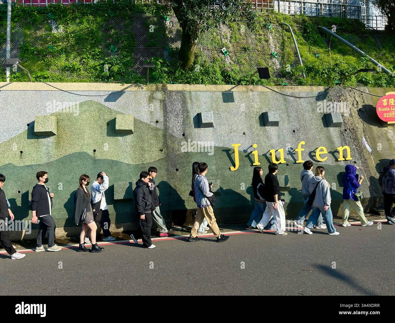 Jiufen, Taiwan, Crowd Young People, Tourists, Walking on Street in Line, Visiting Tourist Area, Sign - Smartphone Captured Stock Image Jiufen, Taiwan, Crowd Young People, Tourists, Walking on Street in Line, Visiting Tourist Area, Sign - Smartphone Captured Stock Image