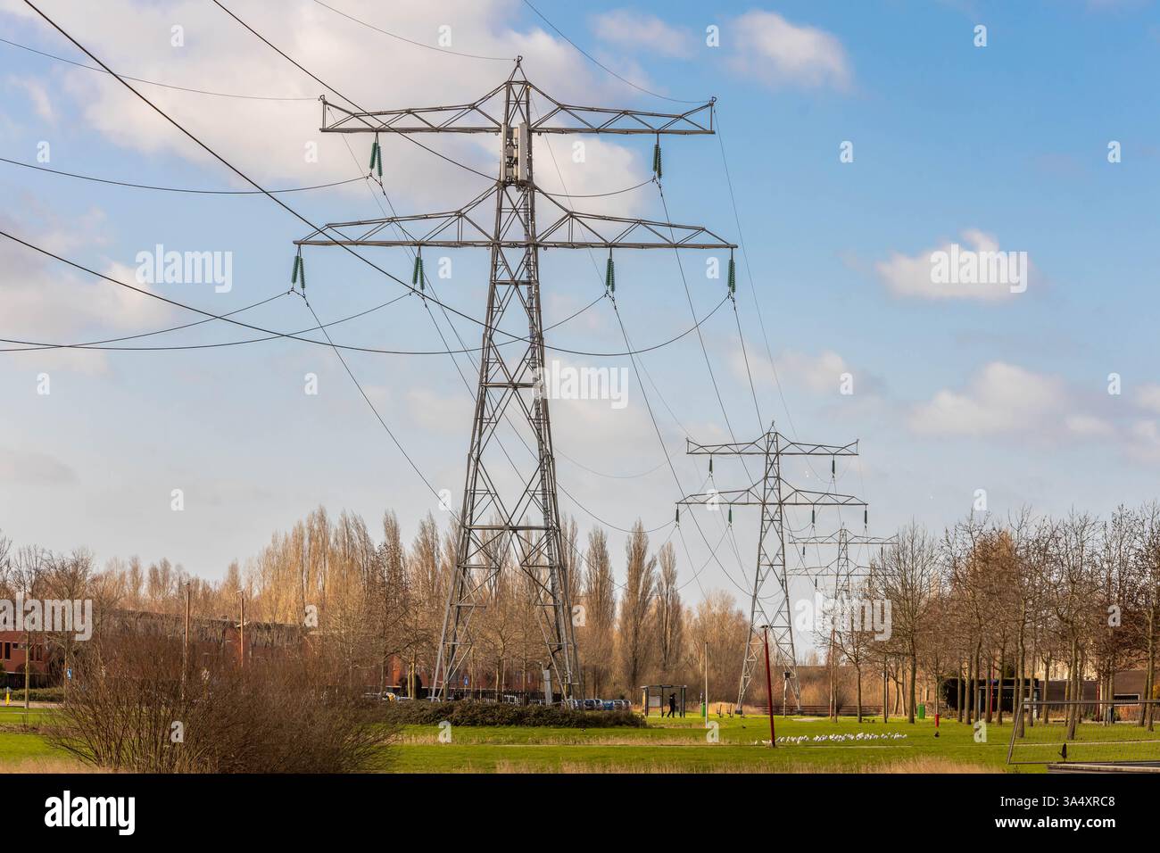 Electricity pylon in the middle of a residential area with family ...