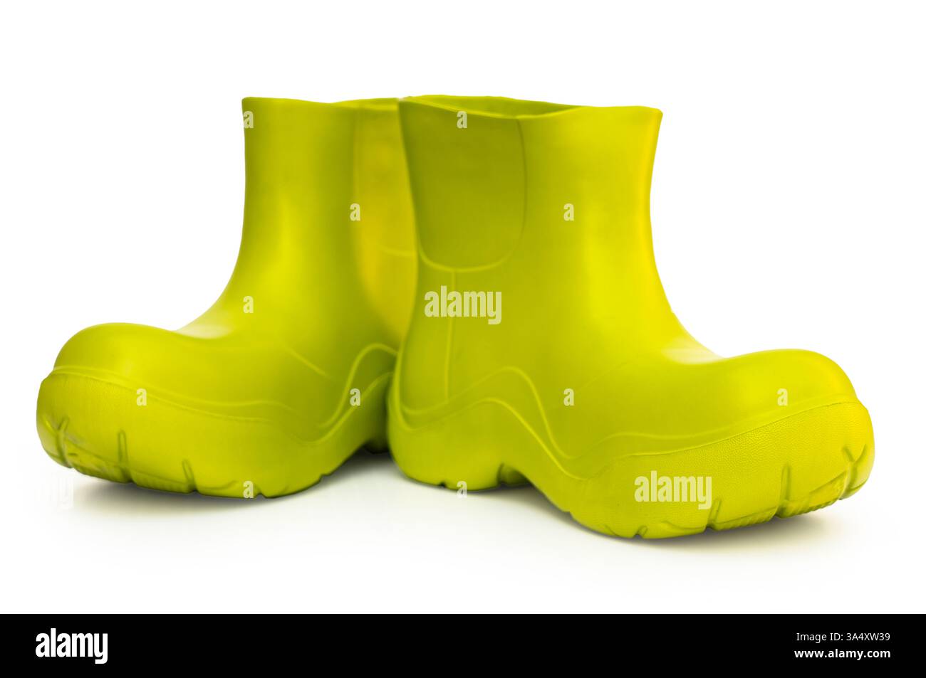 green rubber boots on white isolated background Stock Photo - Alamy