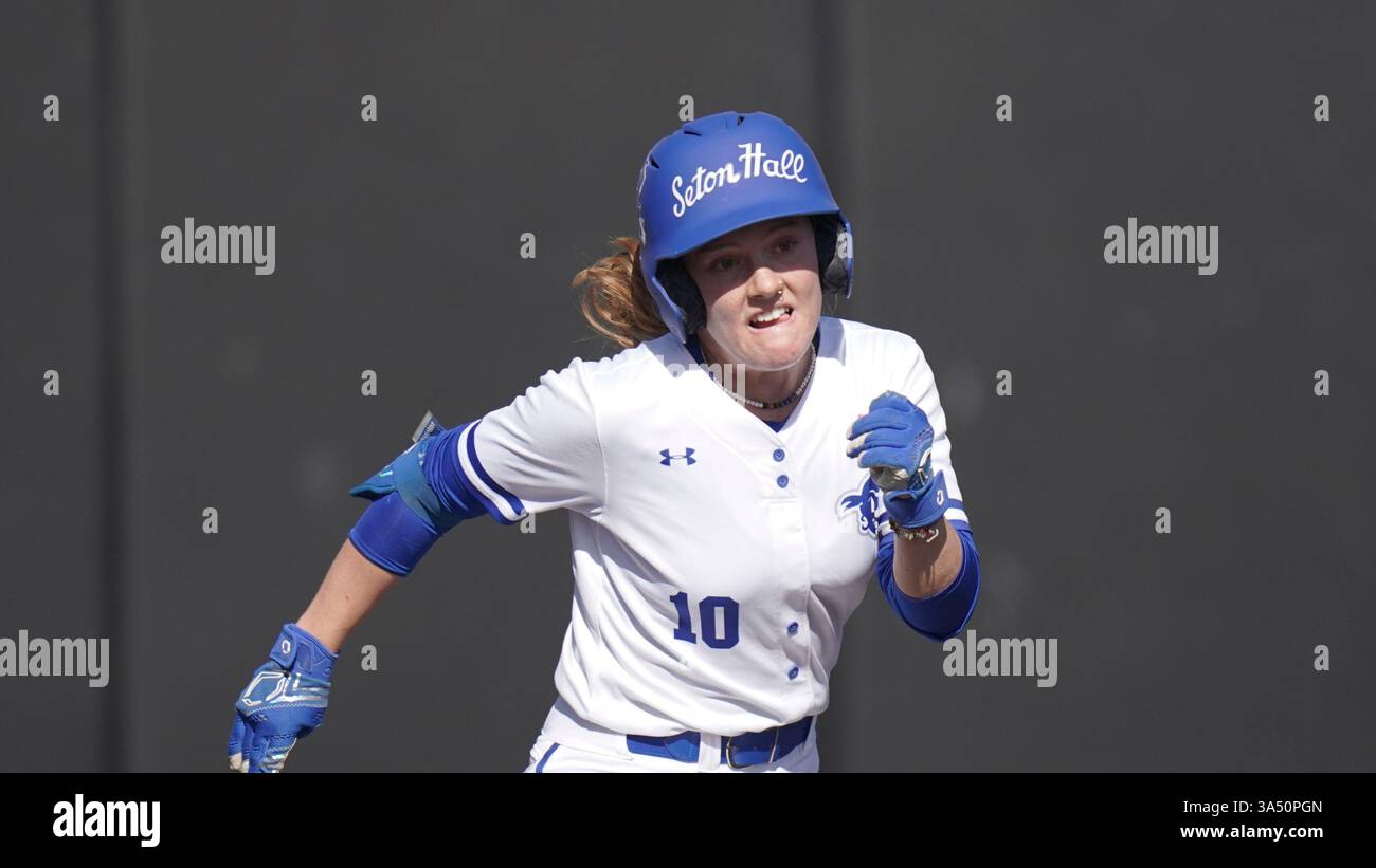 Seton Hall outfielder Amber Johnson (10) runs to first during an NCAA ...