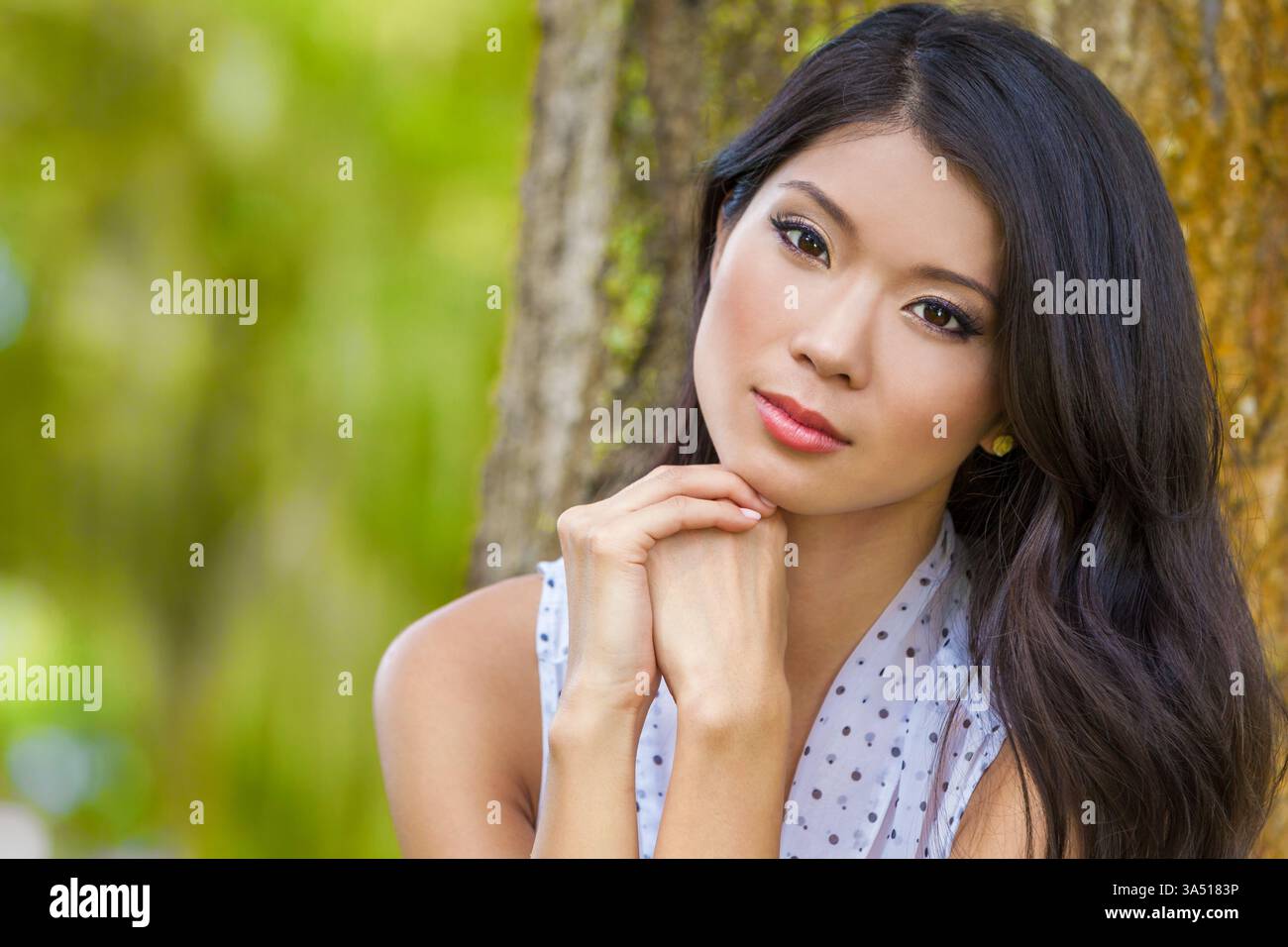 Woman park sad outdoor thoughtful hi-res stock photography and images ...