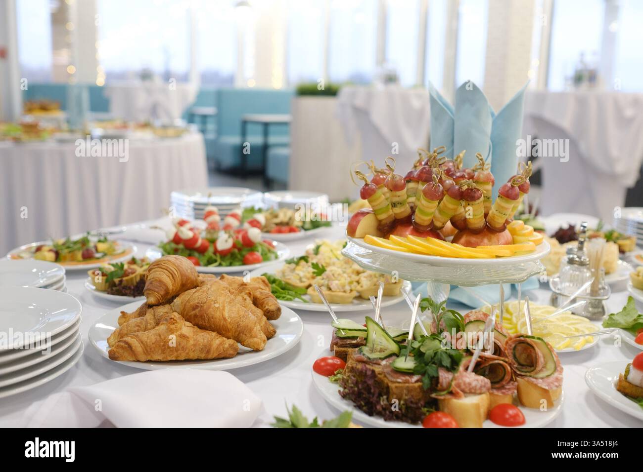 A vibrant buffet on display includes a variety of appetizers, fresh ...