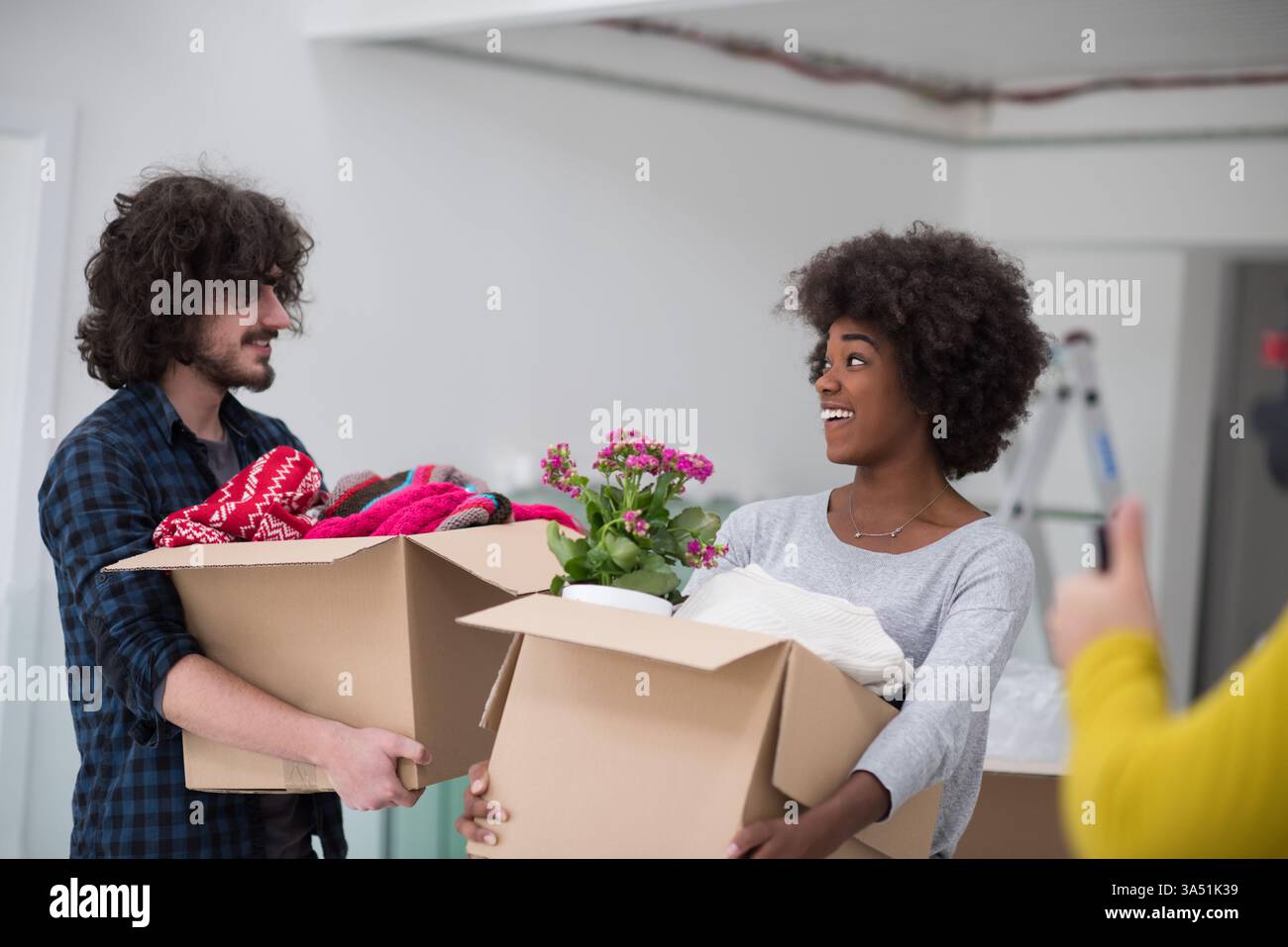 Black family moving house hi-res stock photography and images - Alamy