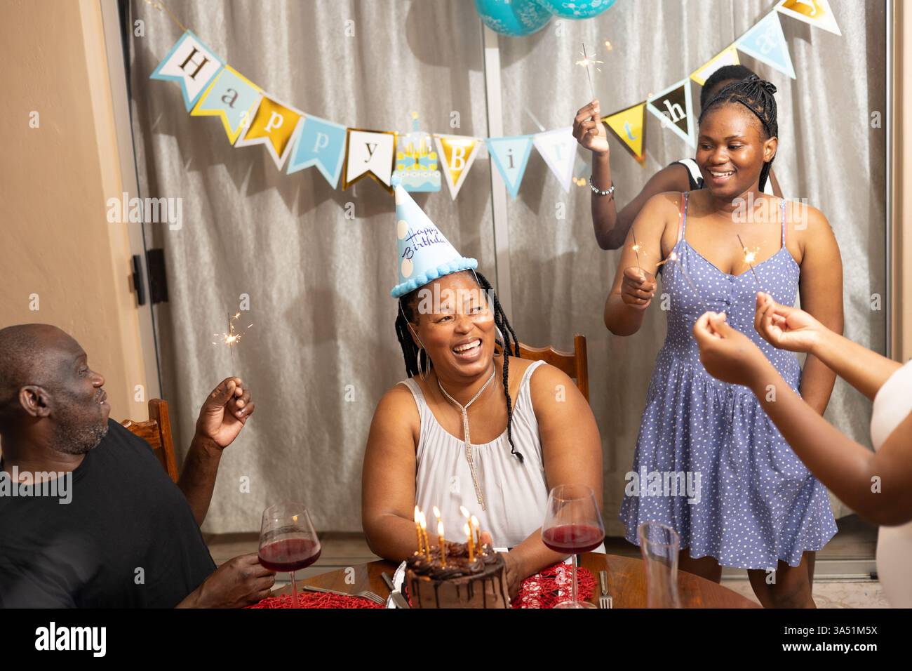 Family member smiles during hi-res stock photography and images - Alamy