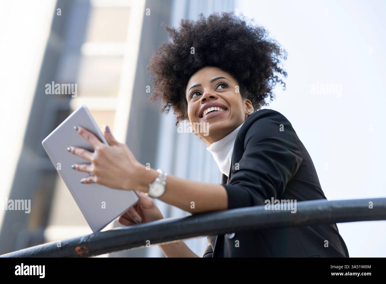 Women in suit on black hi-res stock photography and images - Alamy